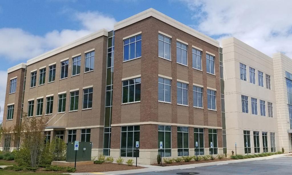 > > A 26,567-square-foot Class A office building is under construction at 615 Congaree Road and the delivery date has been pushed back to November of 2018.