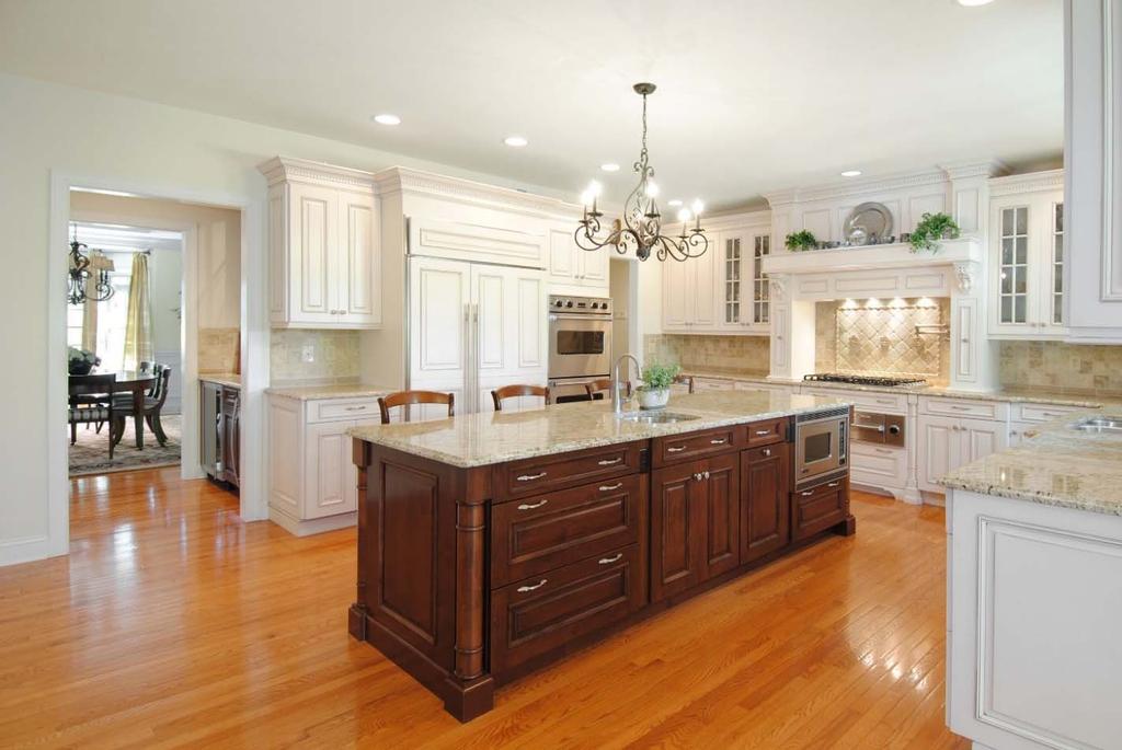 Kitchen 26 x 16, plus Breakfast Room 12 x 12: The kitchen is a masterpiece! The furniturequality cabinetry is Wood Mode, known for superior workmanship for over 60 years.