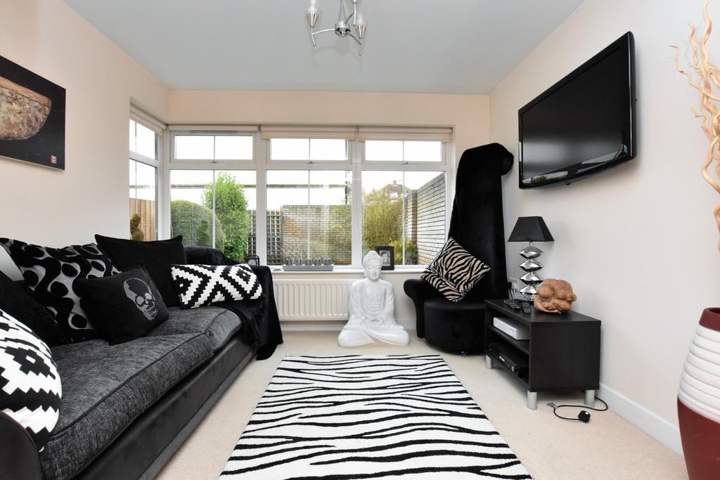 Well presented end townhouse offering excellent accommodation Bright lounge with French doors to Juliet balcony Modern fitted kitchen with integrated appliances, open plan to dining area Four