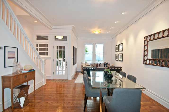 The LIVING/DINING ROOM and the open KITCHEN with SITTING & BREAKFAST AREAS are conducive to today s style of relaxed dining and entertaining.