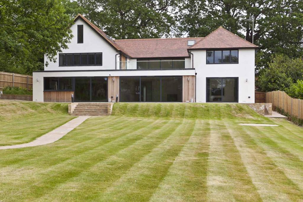 WOODLAWN Weybridge Situated in the heart of Weybridge this robust village property has been transformed into a luxury