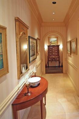 the Powder Room P owder Room Carpet; window; furniturestyled vanity with onyx sink; lowboy toilet T o