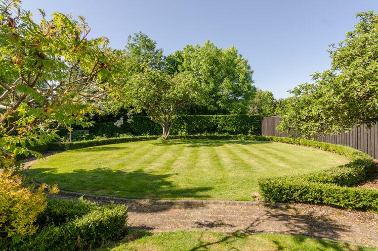 Superbly designed rear gardens with mature