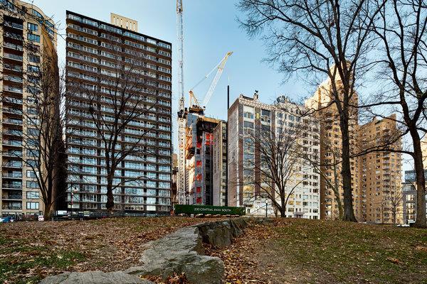 220 Central Park South, with cranes, is under construction. A triplex at the fast-selling building reportedly is in contract for $200 million. Just down the street and a few months later, Jeff T.