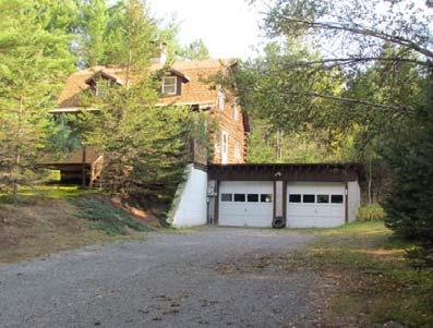 attached 2-car garage on 4.1 acres.