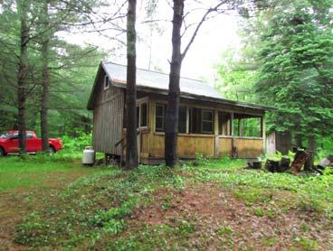 bath singlewide on 0.5 acre w/150 WFF on channel to Chase Lake.
