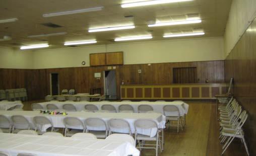 Downstairs contains a kitchen, storage areas, one restroom and large multi-purpose hall with a capacity of 226 persons for