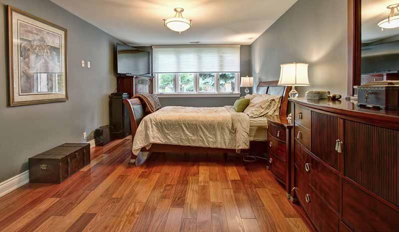 The main floor bedroom wing features a private entrance to two updated