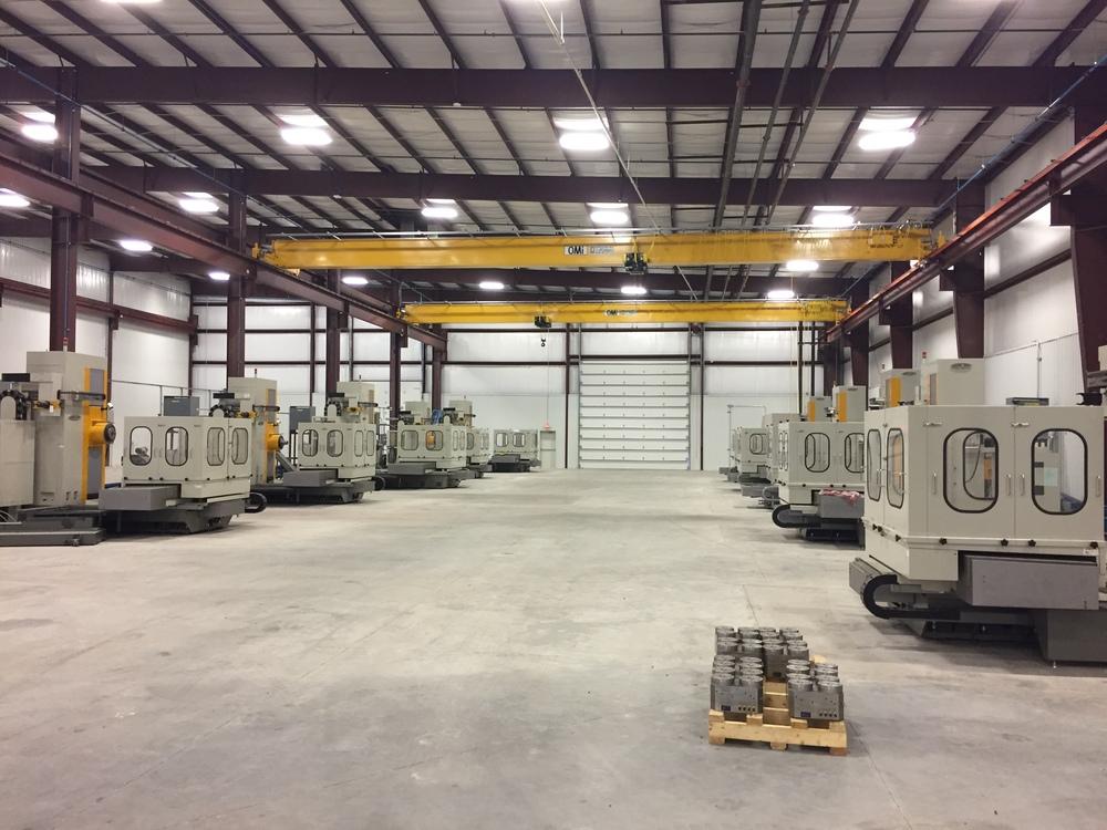 All grade level doors (5) 20' and (7) 16' tall (6) 5 ton and (7) 10-ton bridge cranes. Compressed air throughout. 50,000 SF is climate controlled manufacturing space.