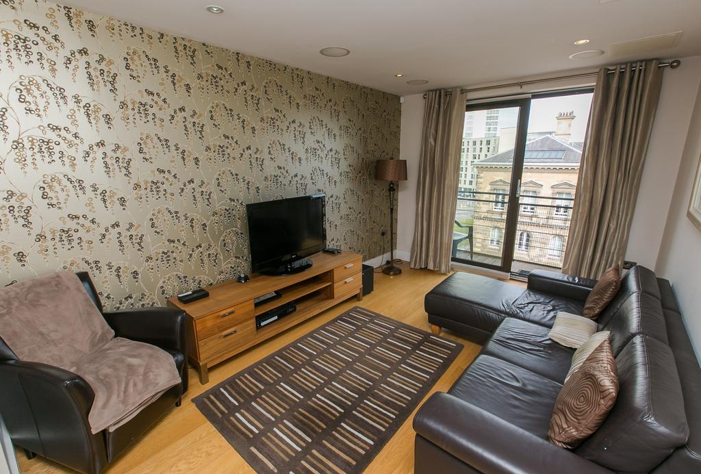 KEY FEATURES Stunning Fith Floor Apartment Directly Overlooking The Custom House Square ONE ALLOCATED PARKING SPACE One Double Bedroom With Balcony Access Overlooking The Custom House Square Bright