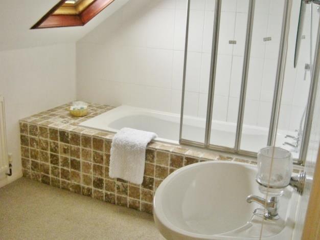 Walk-in shower, pedestal wash basin, low flush WC, electric shaver point, tiled floor, extractor fan. Bedroom 5 12' 11'' x 14' 1'' (3.93m x 4.