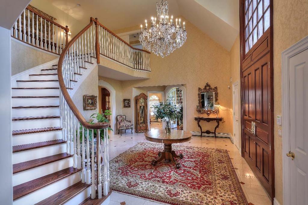 foyer an ideal entry and pivot for this true center hall colonial!