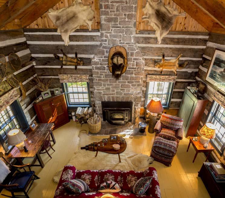 A floor to ceiling stone wood burning fireplace warms the entire structure.