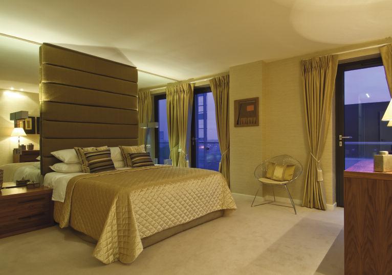 Suite Dreams The stunning master bedroom offers panoramic views over the