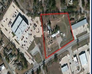 714 Melton St., 1.18 unrestricted acre in downtown Magnolia, established commercial area next to Sonic, and the Renaissance Shopping Center.
