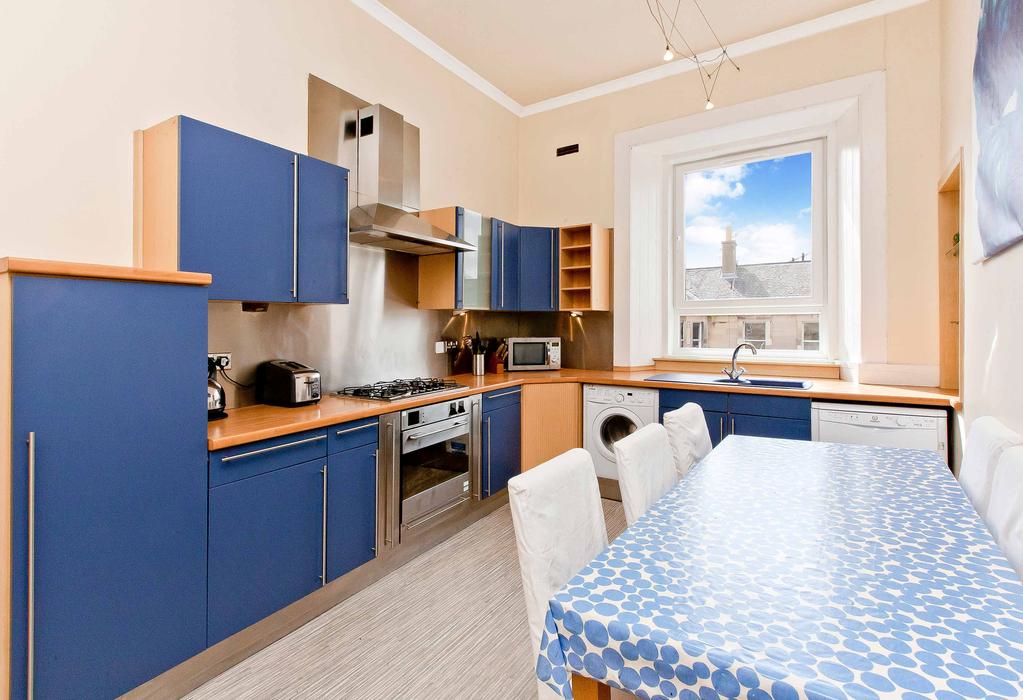 Presenting a desirable period home in one of Edinburgh s most popular city districts, this two-bedroom (plus two box rooms) third-floor Victorian flat exudes all the charm and airiness of a