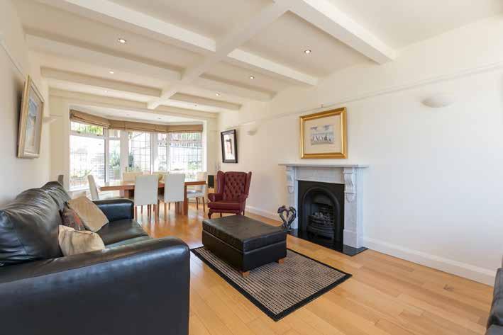 immaculate and modernised, detached extended home is located in a sought after quiet residential area within Malone on a fabulous mature and elevated site.