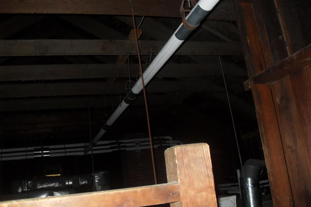 The attic There enough room in most of the attic to fight fire Some of the attic has wood floors, and in some places you are walking on the wood ceiling of the