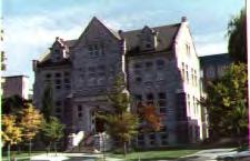 C. Character Defining Elements For Gordon Hall, the Kingston limestone cladding, the Collegiate Gothic style, the symmetrical composition, the main entrance stairway, door surround and fan-lights,