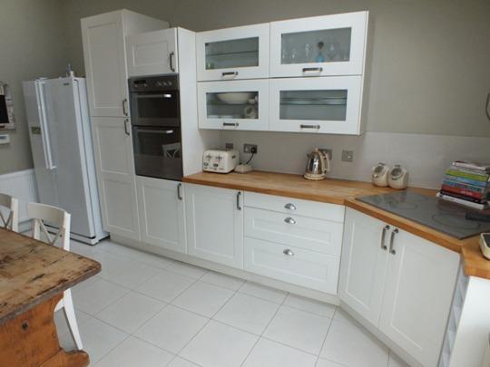 Beautifully Refurbished Kitchen / Utility Area (approx 16 2 x 16 0) Delightful kitchen fitted with an extensive range of white fronted base, wall and drawer units along with glass display cabinets.