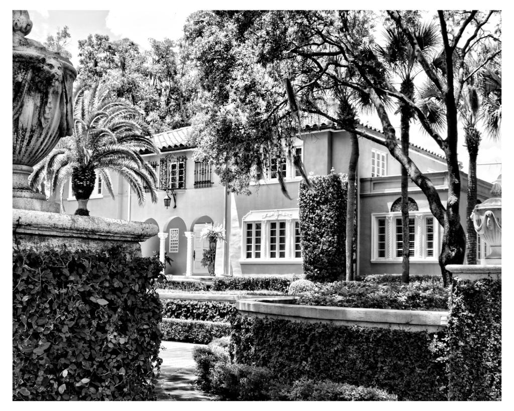 September 1000 West Lake Adair Blvd, Photo by Wayne Schneck The Mediterranean Revival style residence at 1000 Lake Adair Boulevard was constructed in 1936 for citrus grower Joseph Gentile, Jr.