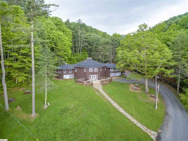 The Lodge at Headwaters MLS# 577081 - $3,445,000 6983 Cowpasture River Rd (The Lodge) 9068 square feet Library 2 sets of men s baths New deck ( 17) Sleeps 90 people Fully furnished Wood burning