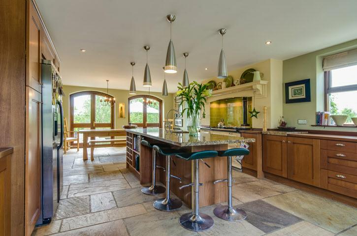 LUXURY FITTED KITCHEN OPEN PLAN TO DINING AREA: 28' 2" x 15' 8" (8.59m x 4.
