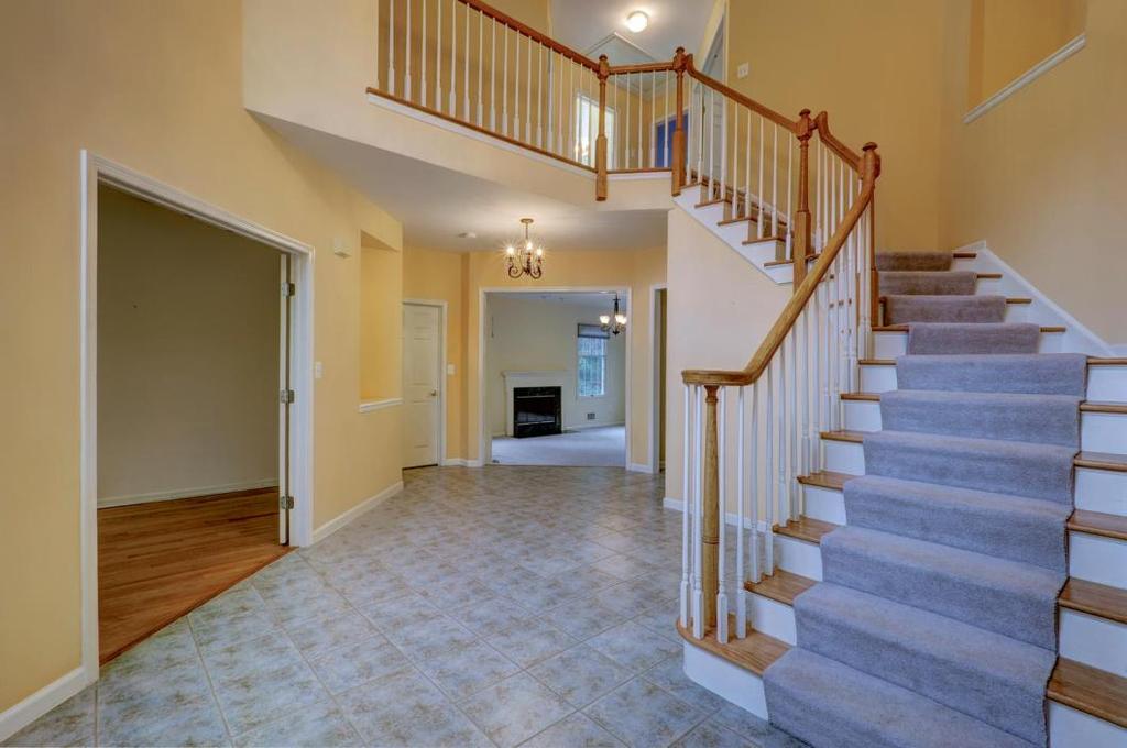 Foyer: As you enter this lovely home, the two story