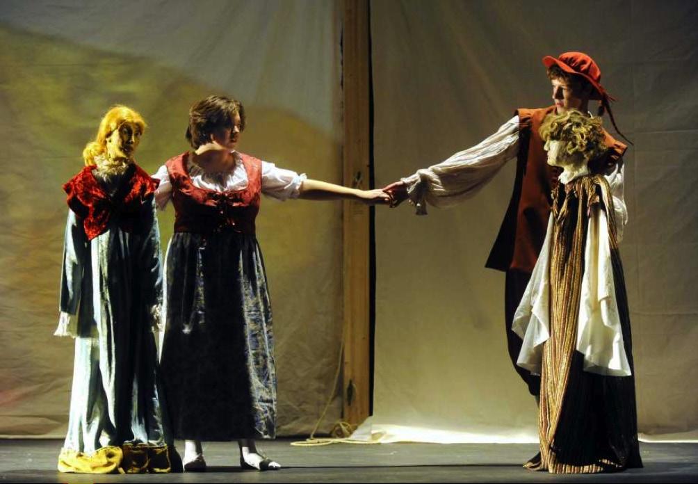 Kate Cuellar, with Miranda, and Dallas Atkins, with Ferdinand, rehearse La Tempesta for the Teatro del Drago adaption of Shakespeare s The Tempest