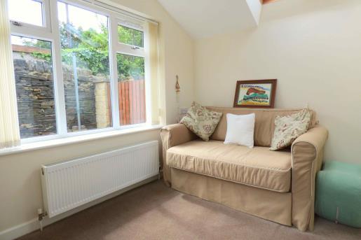 With double radiator, upvc double glazed window to the rear elevation, fitted carpets, fitted blinds, TV access point and