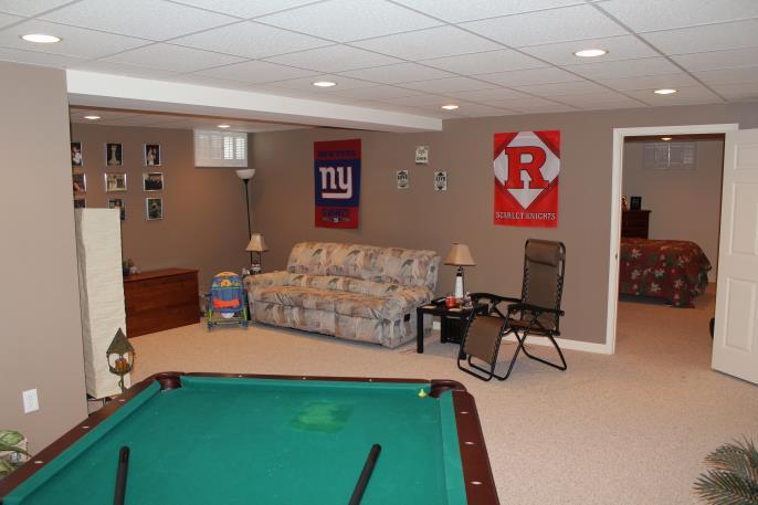 Lower Level Description: The basement has been mostly finished and is a great space to make a whatever