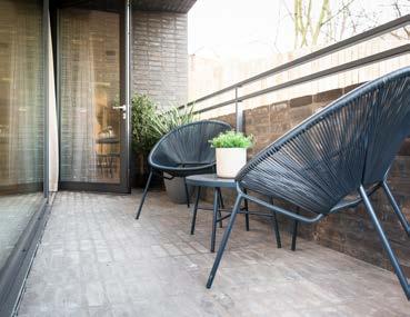 OUTDOOR AREA Each property includes a private brick-floored balcony, perfect for