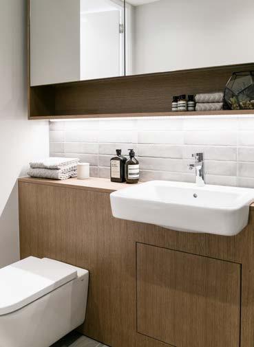chrome-plated heated towel rail and soft-close dual flush WC ensures