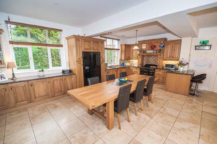 OPEN PLAN KITCHEN/LIVING/DINING: 23 0 x 23 0 (7.01m x 7.01m) Solid Oak country style kitchen with excellent range of high and low level units, wine rack 1.