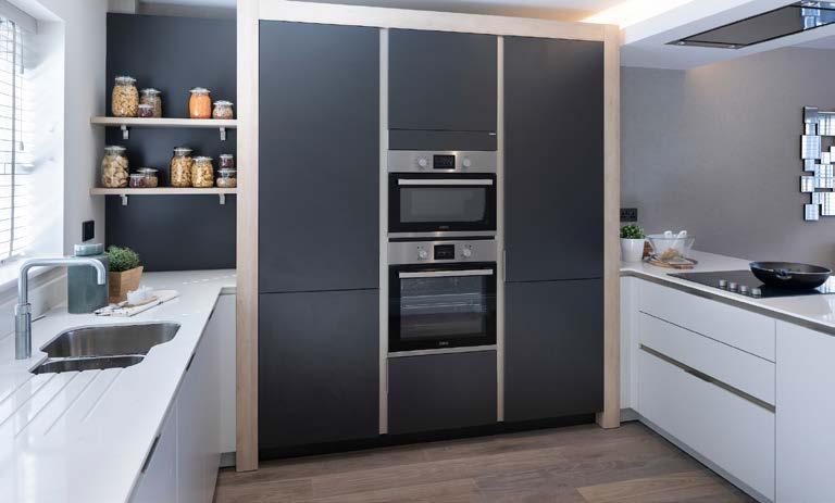 Perfect Finish Kitchen Siematic kitchens with silestone work surfaces and floor tiling Integrated appliances including stainless steel oven, induction hob, fridge/freezer, dishwasher and microwave