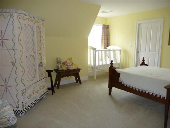 SECOND FLOOR Bedroom: 12 x 19.5, carpet, walk-in closet, dormer.