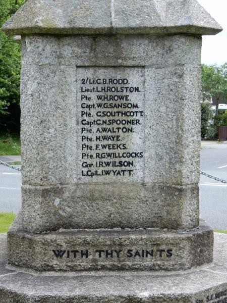 The War Memorial is a decorative cross on a plinth and five steps at the junction of