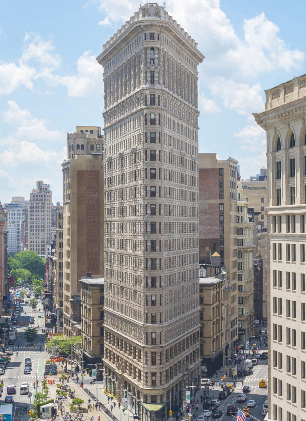 175 FIFTH AVENUE The triangular 22-story landmark located at 175 Fifth Avenue, the Flatiron Building was considered to be a pioneering skyscraper of its era.