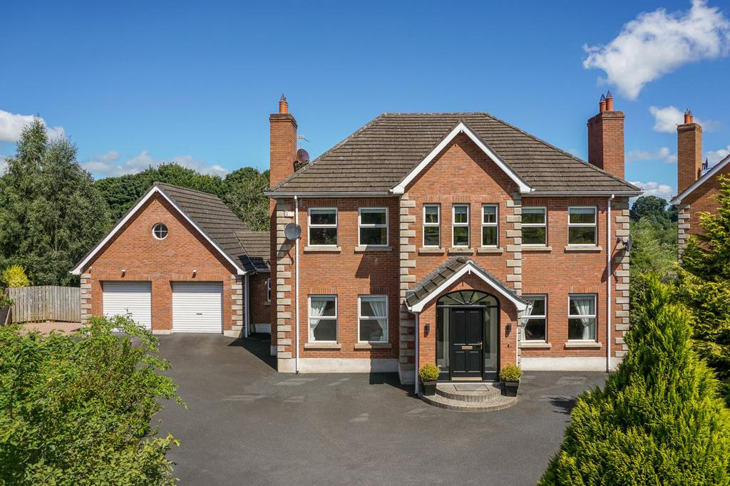 This superb and attractive extended detached family home is situated on an unusually spacious and private site in a quiet cul-de-sac off the Lagan River within this popular development on Blaris