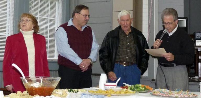 BIRTHDAY PROCLAMATION Ted Huddleston (2 nd from right) celebrated his 80 th birthday on Jan.