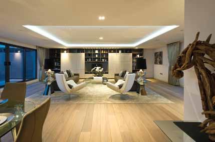 bespoke lighting design, quality porcelain floor and wall tiling and bespoke hand-crafted kitchens.