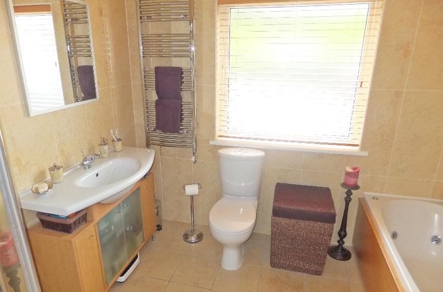 Utility Room: 8'6 x 7'8 With stainless steel sink unit, high and low level cupboards, built in