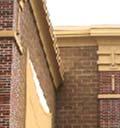 features: A cornice; A parapet; An awning; A canopy; or Eaves.