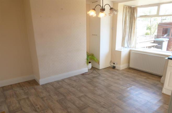 options to Leeds and Skipton. The property briefly comprises: Entrance porch, hallway, living room, open plan dining kitchen and Conservatory.