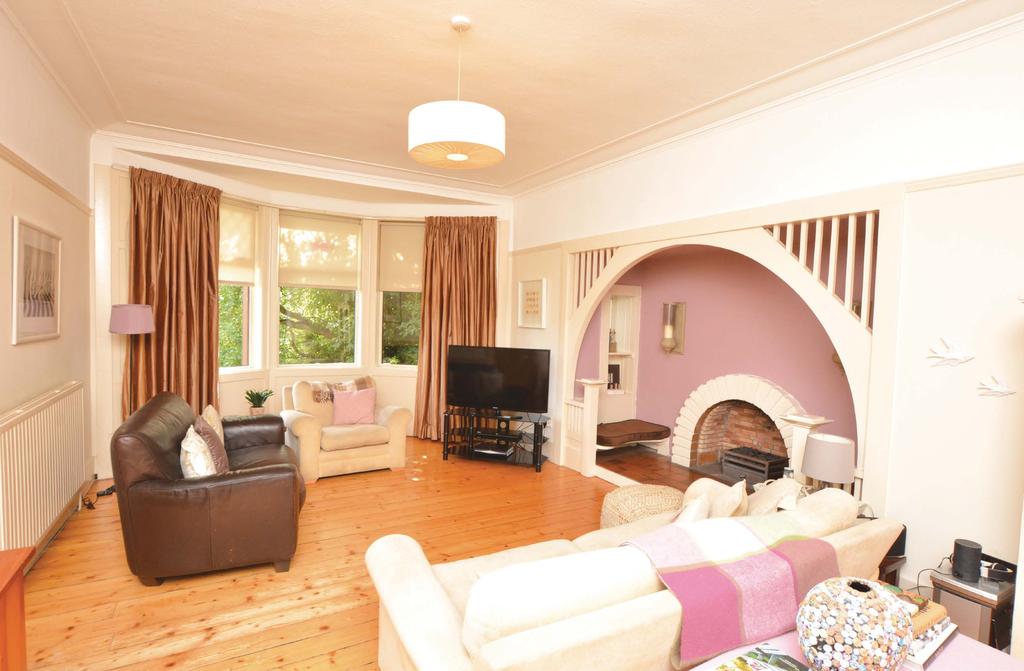 An attractive period detached villa set within large private mature garden grounds.