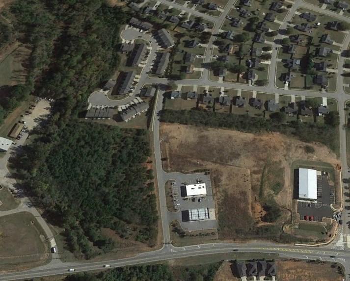 FOR SALE 562 North Highway 42 BANK OWNED Commercial Group 434 Green Street Gainesville, GA 30501 770.297.4800 5.85 +/- Acres Zoned C-1 5.