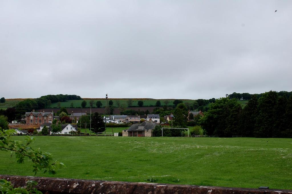 The garden looks out over the adjacent park and across to the hill of Alyth.