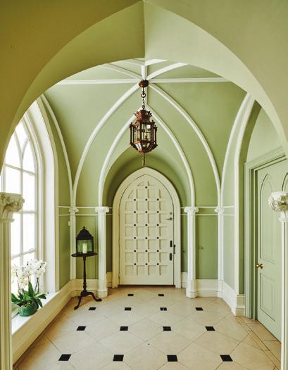 A light filled and spacious entrance hall with bespoke plasterwork leads through to an elegant double drawing