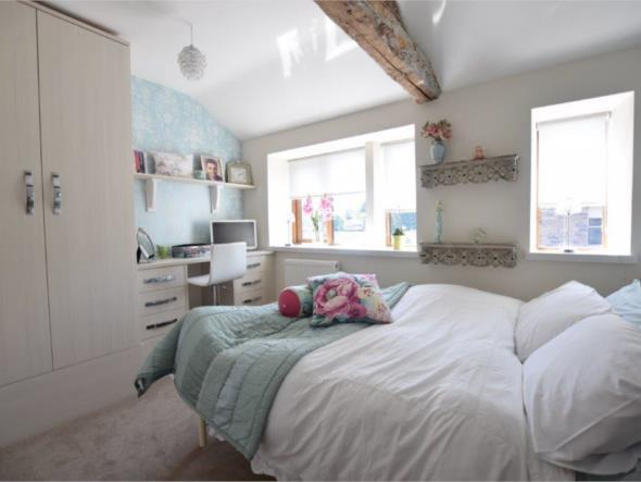 Also a double bedroom with ample space for freestanding furniture It features double glazed mullioned windows with granite window sills There is an exposed timber beam to the ceiling, a central