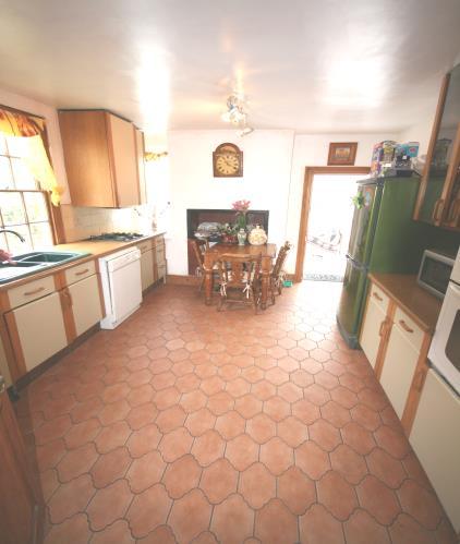 Kitchen: 13 1 x 10 10 Fully fitted kitchen comprising of a range of base and wall units in a cream and